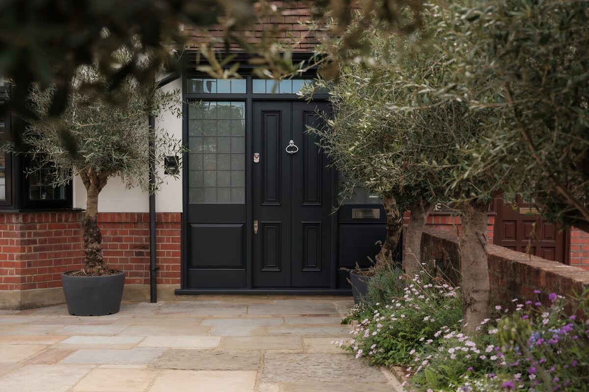 A Calm Color Palette and Warm Materials in a London Home 28 black front door A Calm Color Palette and Warm Materials in a London Home