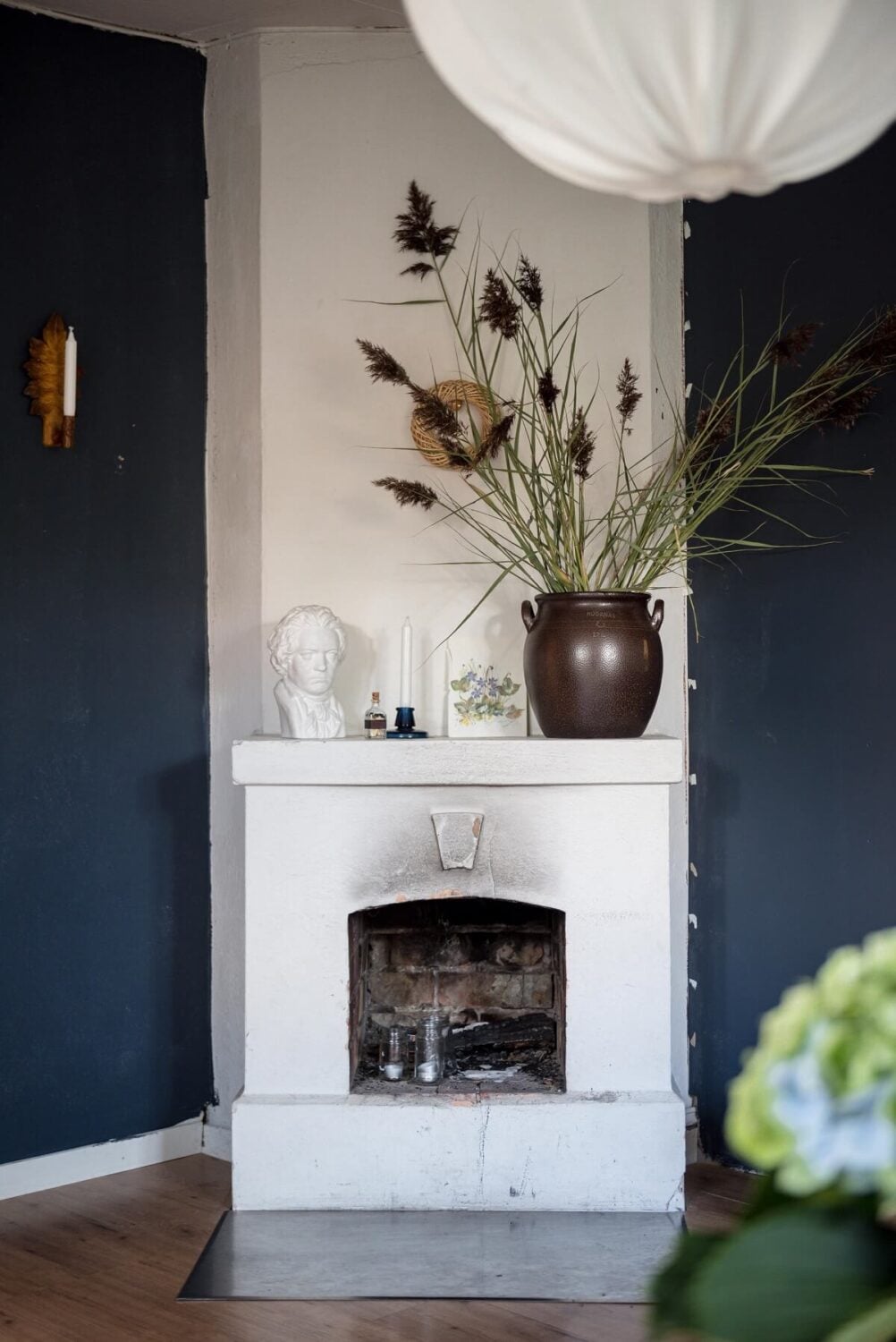 A Charming Country House with a Pink Dining Room and Wallpapers 17 blue living room white fireplace