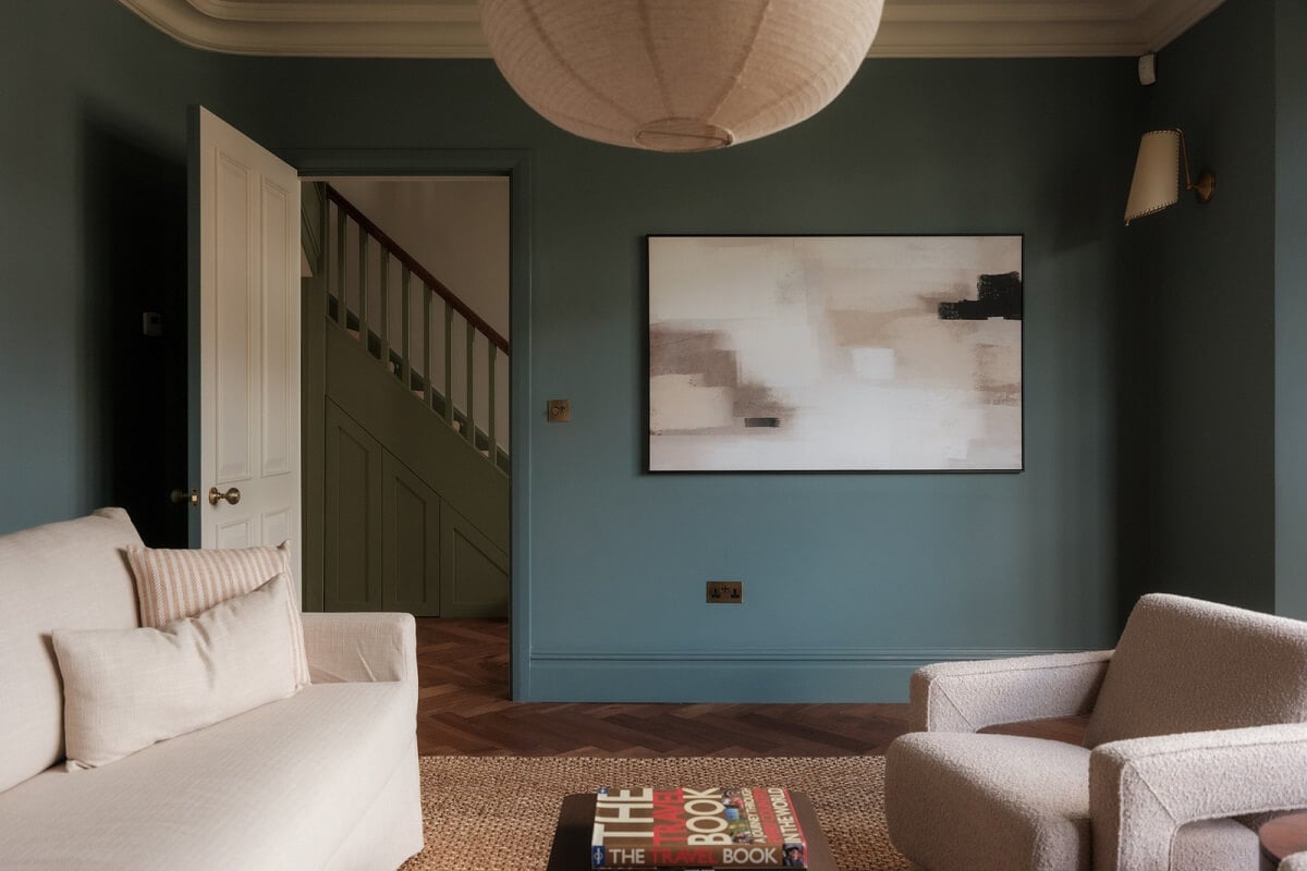 A Calm Color Palette and Warm Materials in a London Home 3 blue living room with light furniture