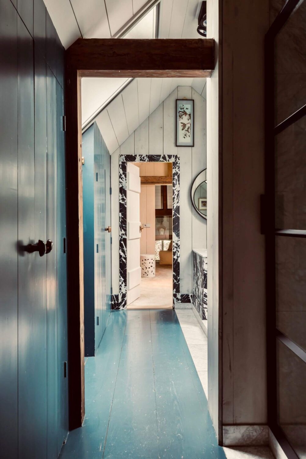 An Eclectic Colorful House in an Old Dutch Farmhouse 27 blue painted wooden floorboards