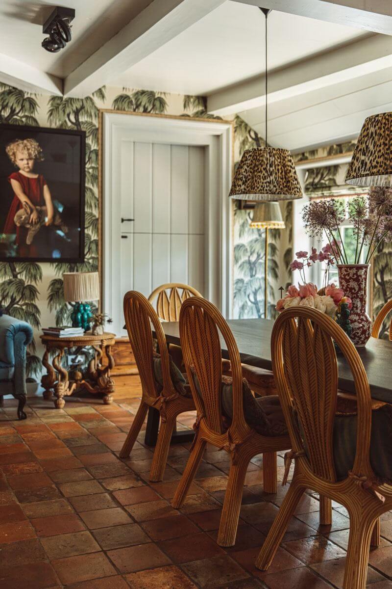 An Eclectic Colorful House in an Old Dutch Farmhouse 9 boho style dining room stone floor wallpaper