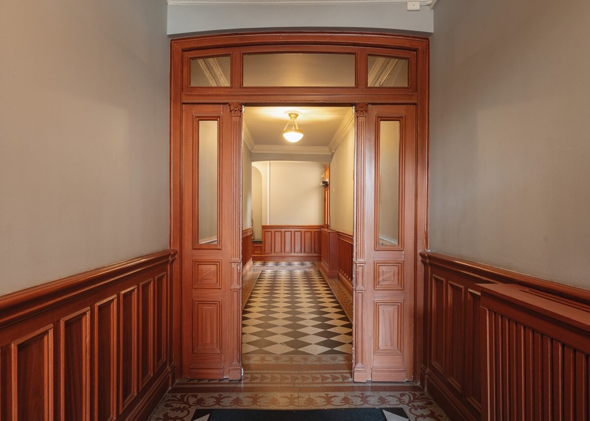 An Apartment with William Morris Wallpaper and a Dull Plum Bedroom 24 central apartment hallway