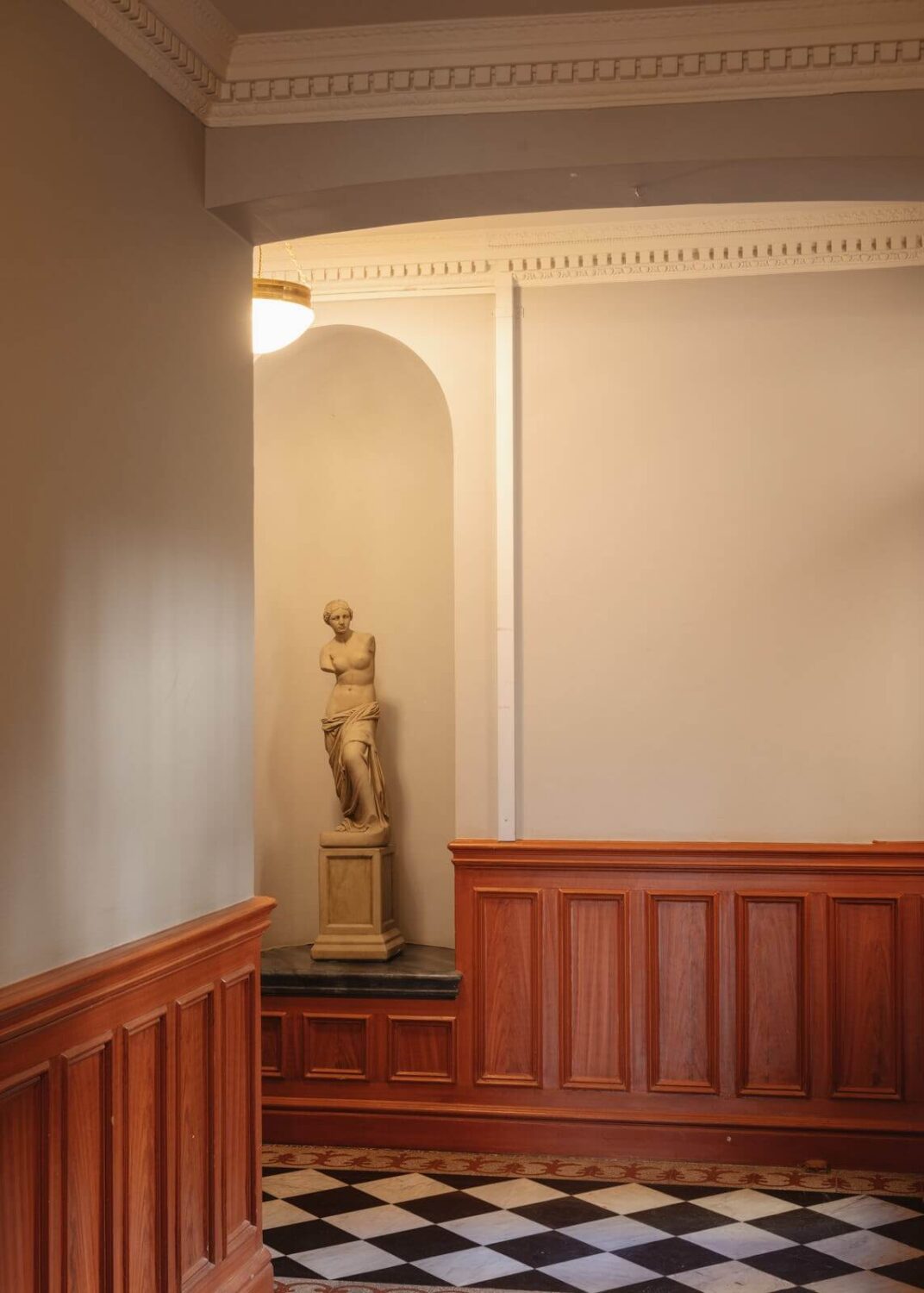 An Apartment with William Morris Wallpaper and a Dull Plum Bedroom 23 central hallway with checkerboard floor