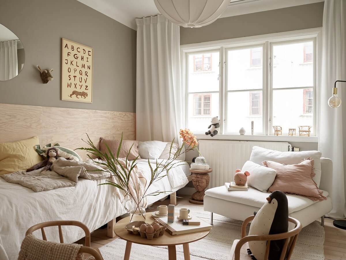 A Swedish Apartment with a Dark Blue Living Room and Exposed Brick 17 childrens bedroom with plywood wall feature and long bed