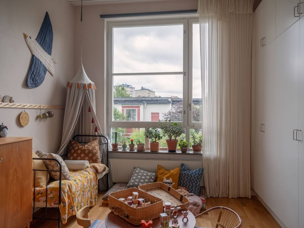 A Scandinavian Family Apartment with a Rusty Red Kitchen 21 childrens bedroom
