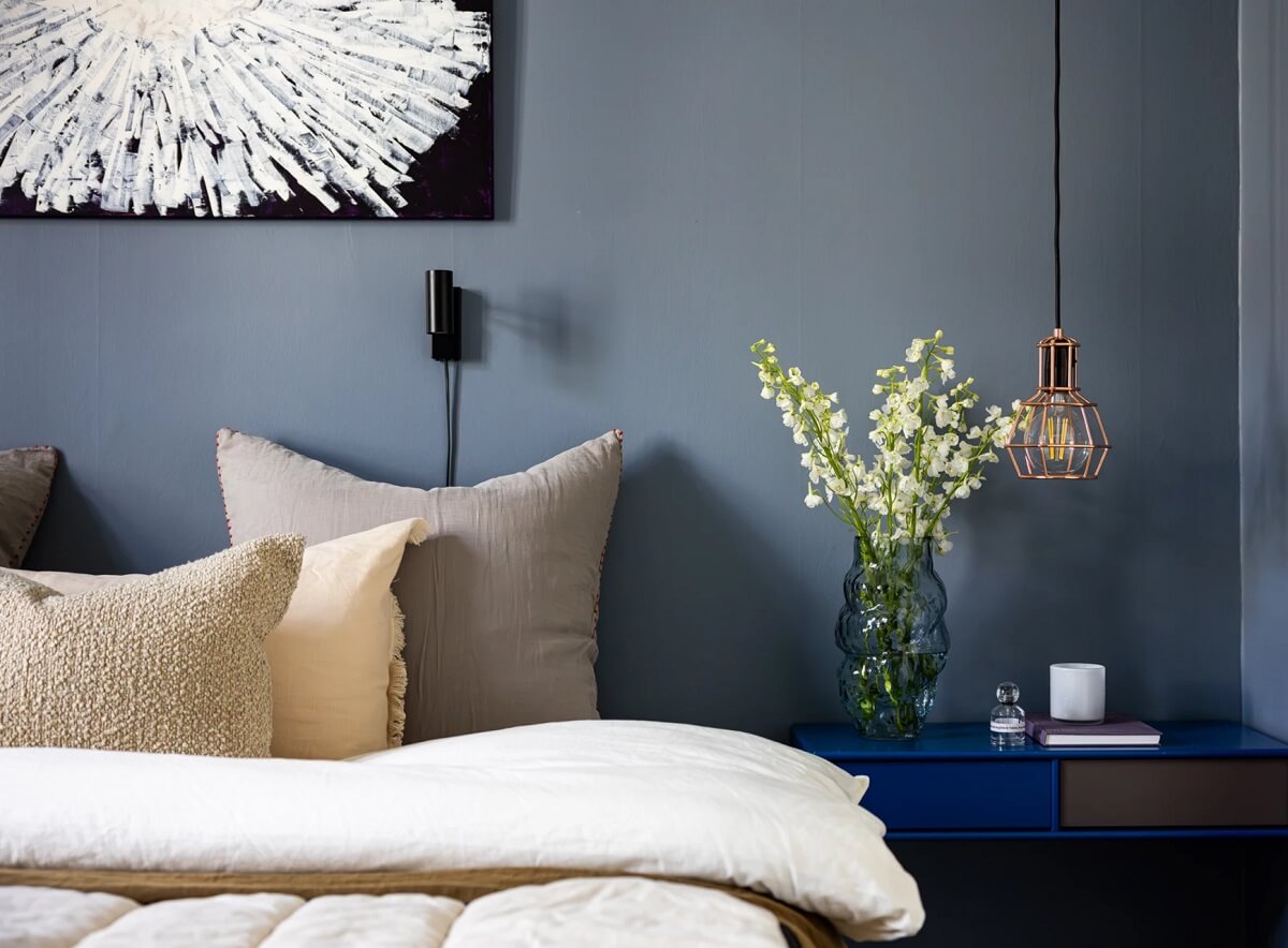 A Swedish Apartment with a Moody Kitchen and Bedroom 12 cobalt blue floating nightstand A Swedish Apartment with a Moody Kitchen and Bedroom