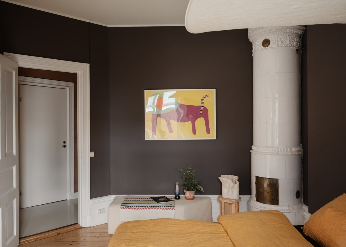 An Apartment with William Morris Wallpaper and a Dull Plum Bedroom 19 dark bedroom wall color and fireplace nordroom