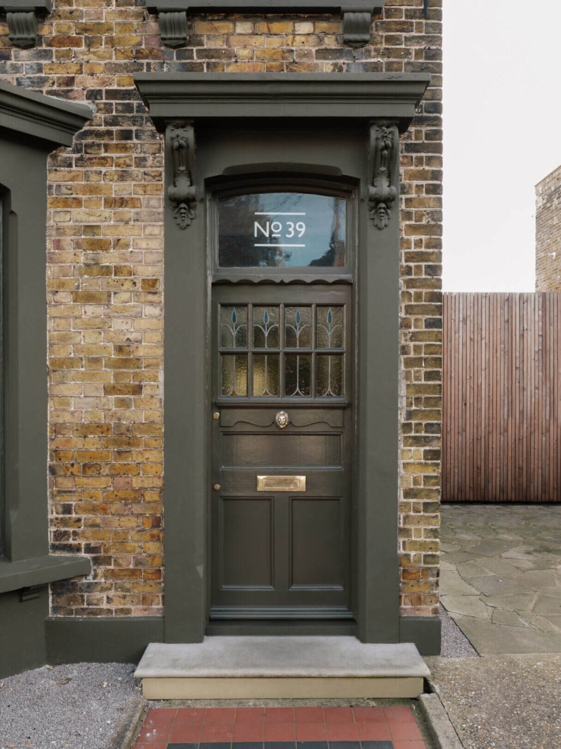 An English House with Carefully Restored Period Features 22 dark gray front door