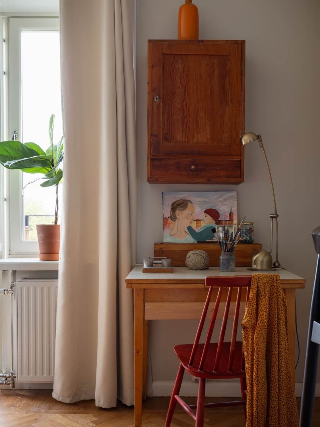 A Small Apartment with an Ochre Yellow Kitchen 9 desk in living room