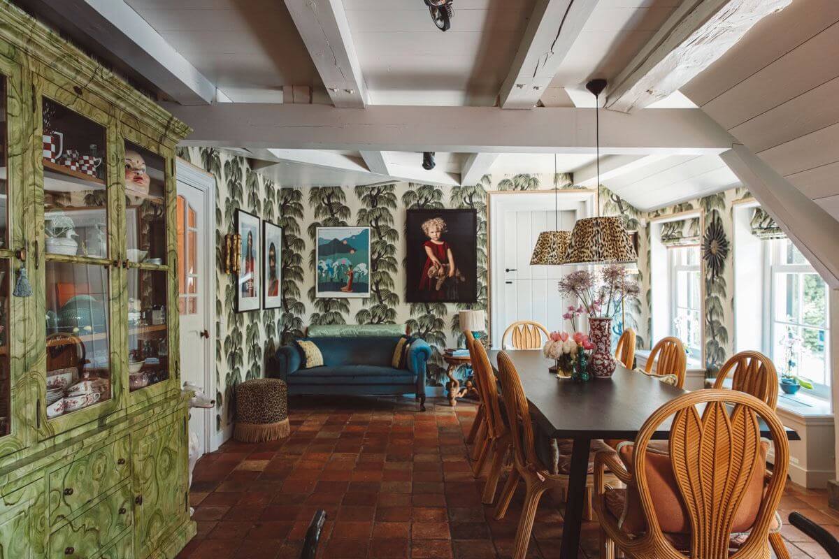 An Eclectic Colorful House in an Old Dutch Farmhouse 8 dining area large table white painted beams