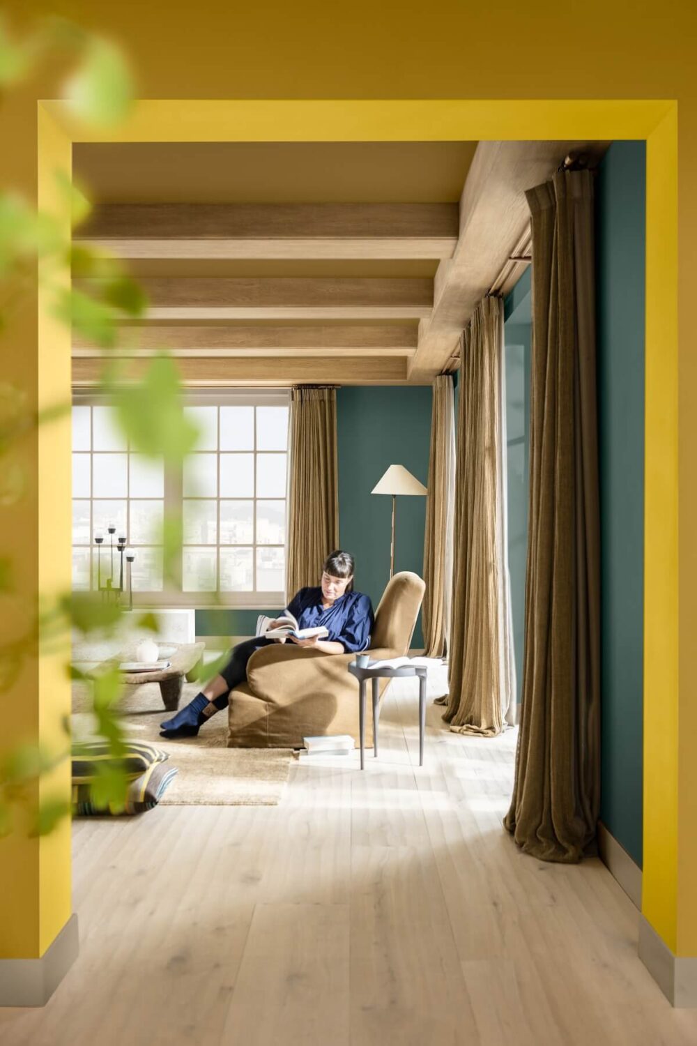 Dulux Colour of the Year 2025: True Joy 34 dulux-colour-of-the-year-2025-True-Joy-Pride living room wooden beams nordroom