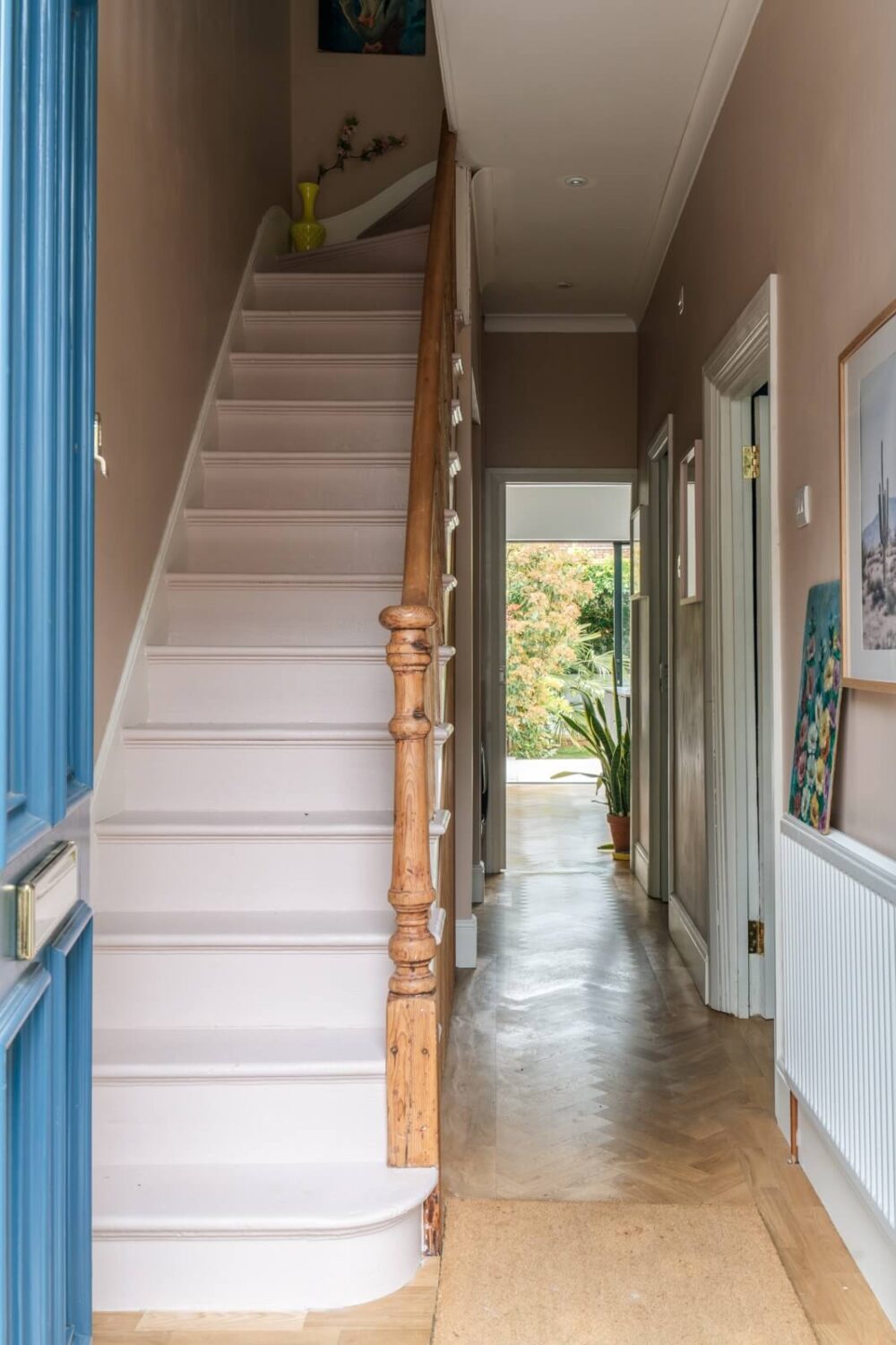 A Dark Blue Living Room in a Historic London Home 13 dusty pink hallway