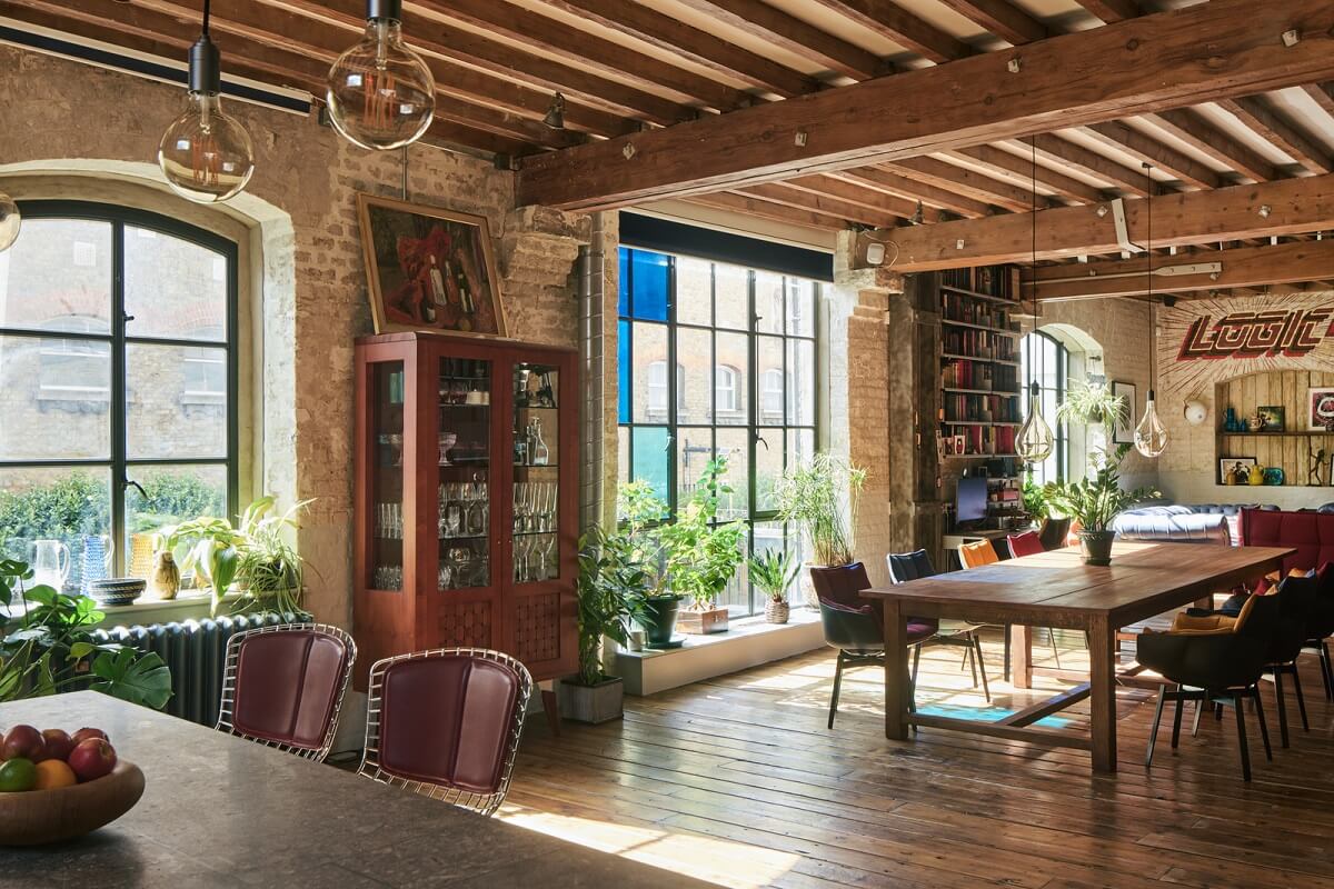 An Industrial and Colorful Warehouse Conversion in London 7 exposed beams in warehouse apartment