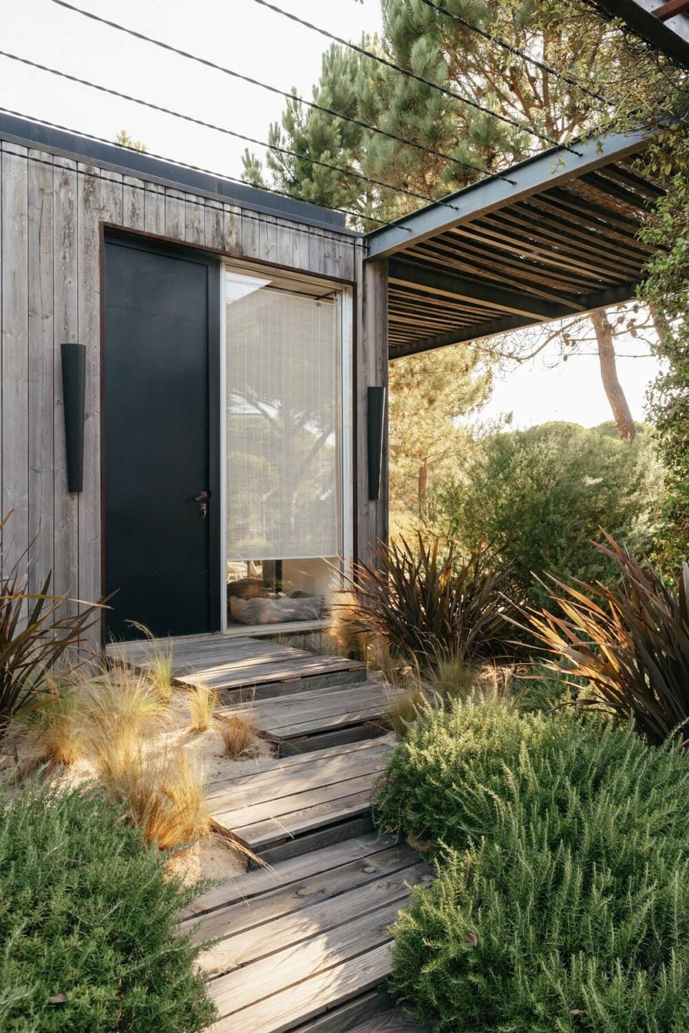An Eco-Retreat Made from Upcycled Materials in Portugal 10 front door portugal An Eco-Retreat Made from Upcycled Materials in Portugal