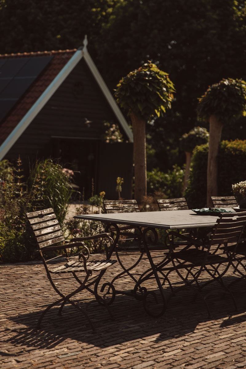 An Eclectic Colorful House in an Old Dutch Farmhouse 40 garden dining table