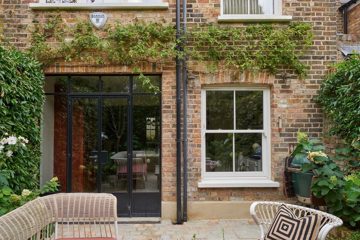 A Luxurious Two-Bedroom Maisonette in Primrose Hill 22 garden exterior steel framed doors A Luxurious Two-Bedroom Maisonette in Primrose Hill