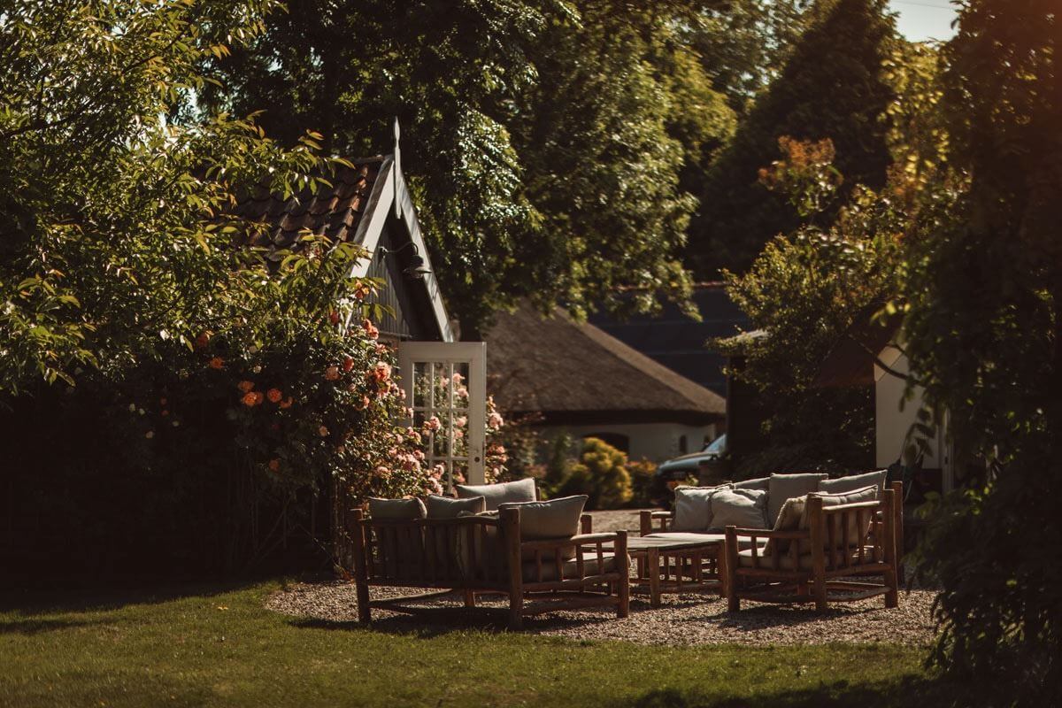 An Eclectic Colorful House in an Old Dutch Farmhouse 38 garden seating old dutch farmhouse
