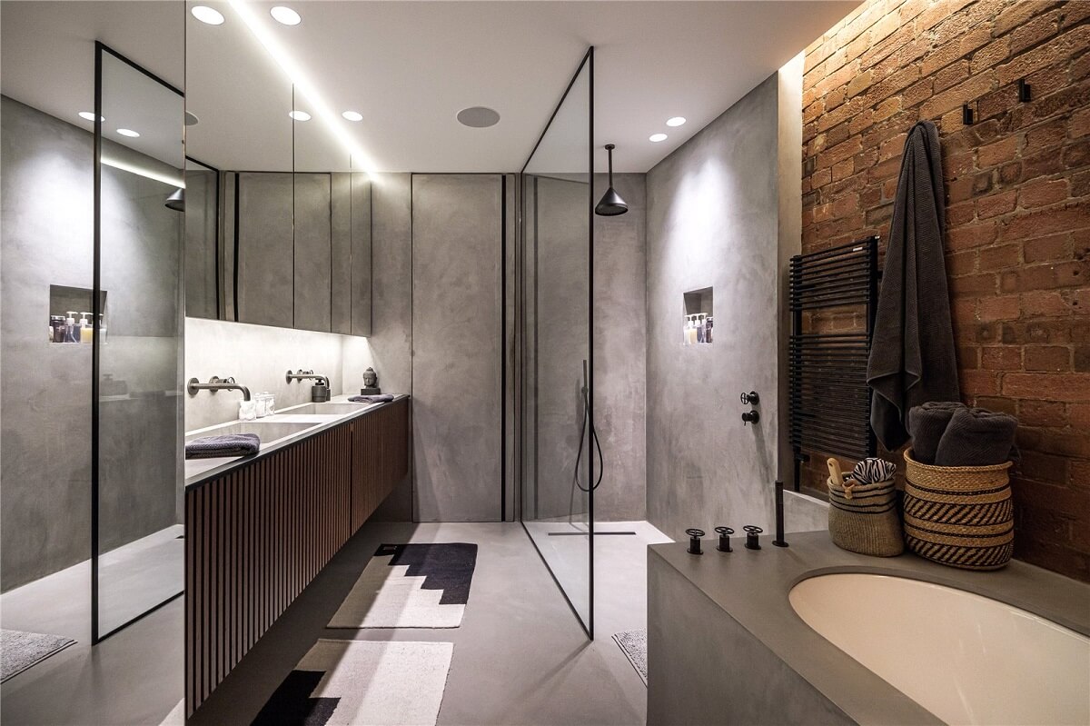 An Industrial, Loft-Style Duplex with Japanese Landscaped Roof Terraces 17 gray bathroom with wak in shower and wooden vanity