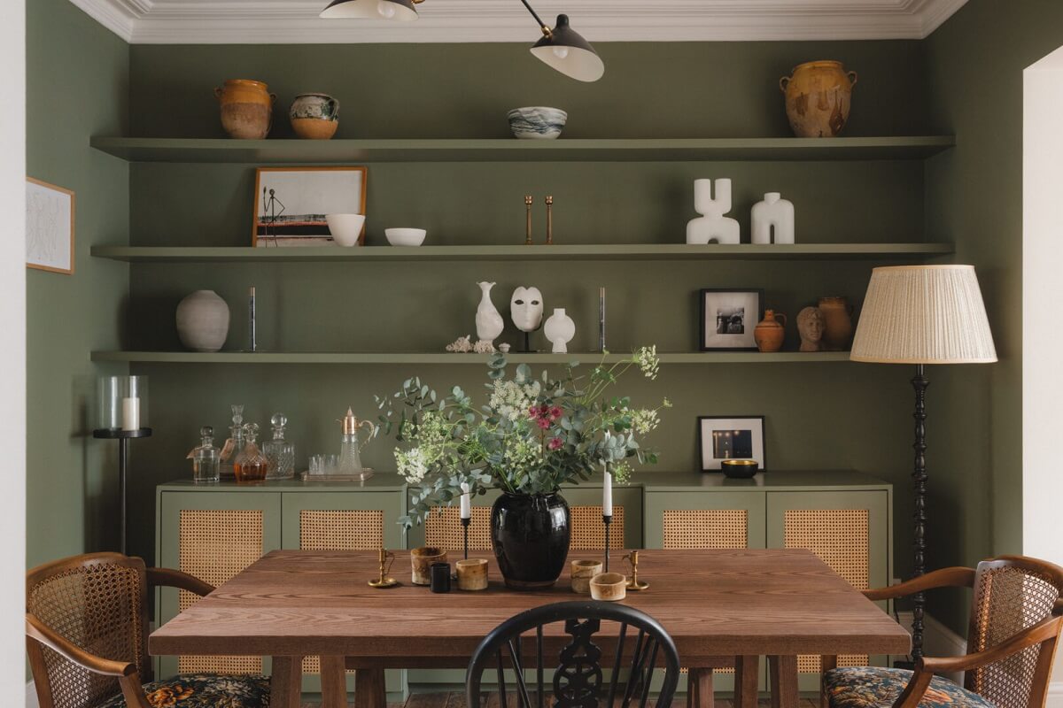 A Soft and Natural Color Palette in a Victorian Home 2 green dining room with shelves
