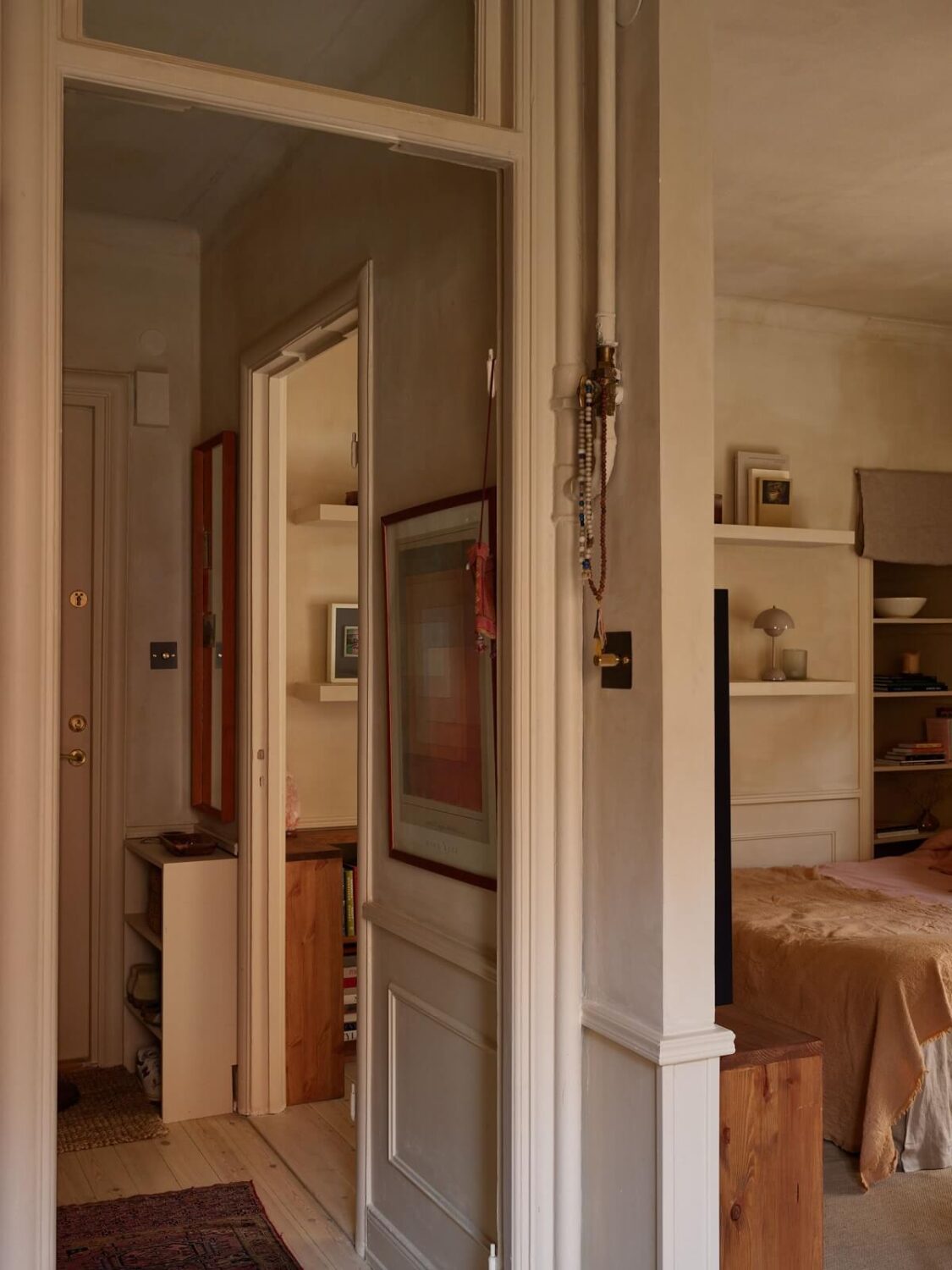 A Studio Apartment with Plaster Walls and a Walnut Kitchen 14 hallway