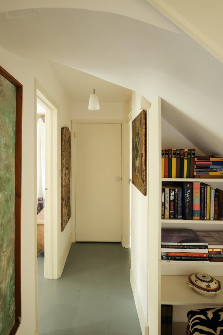 A One-Bedroom Maisonette with a Garden in London 12 hallway blue gray floor