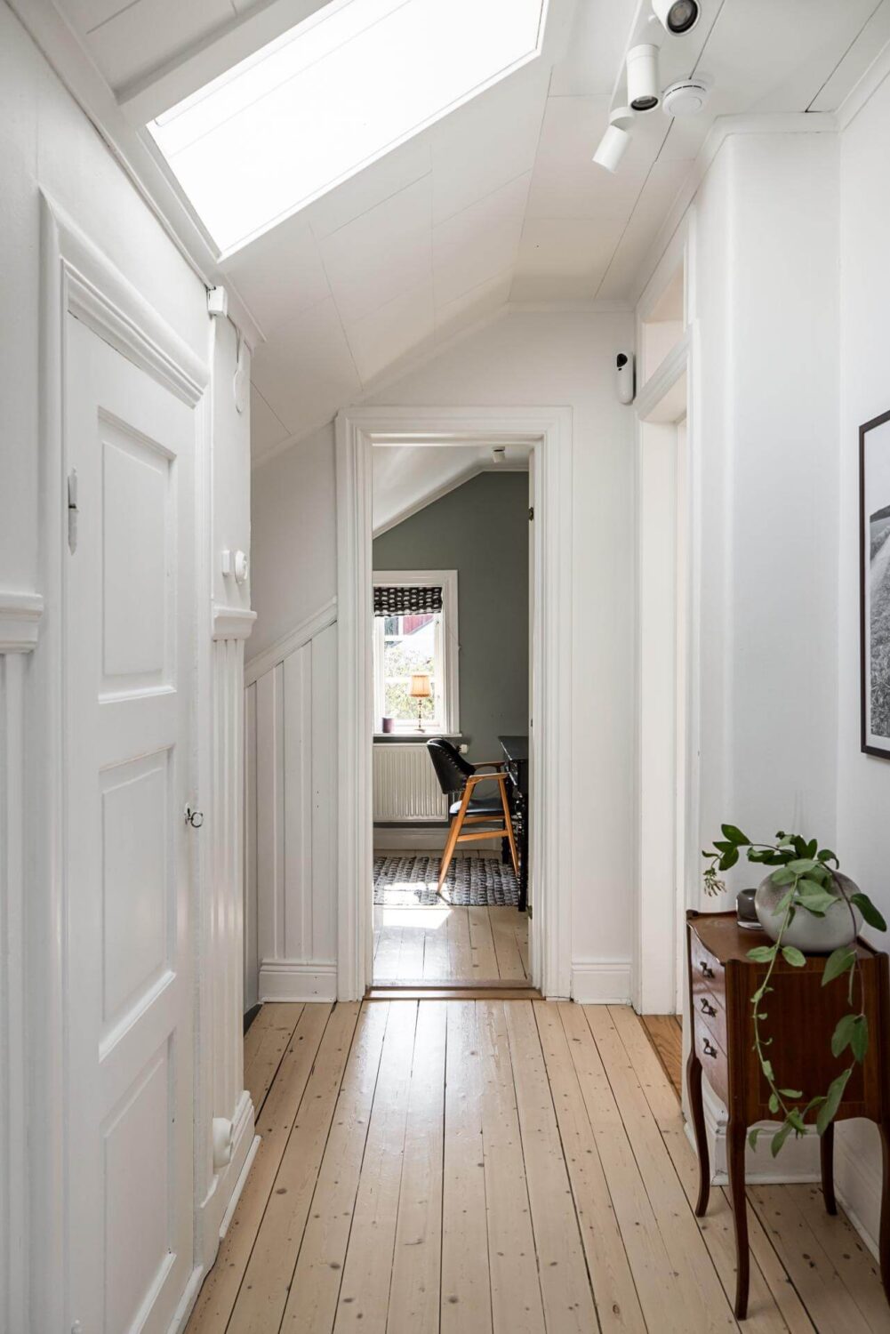 A Lovely Early 20th Century House with Wallpapers 19 hallway skylight wooden floor
