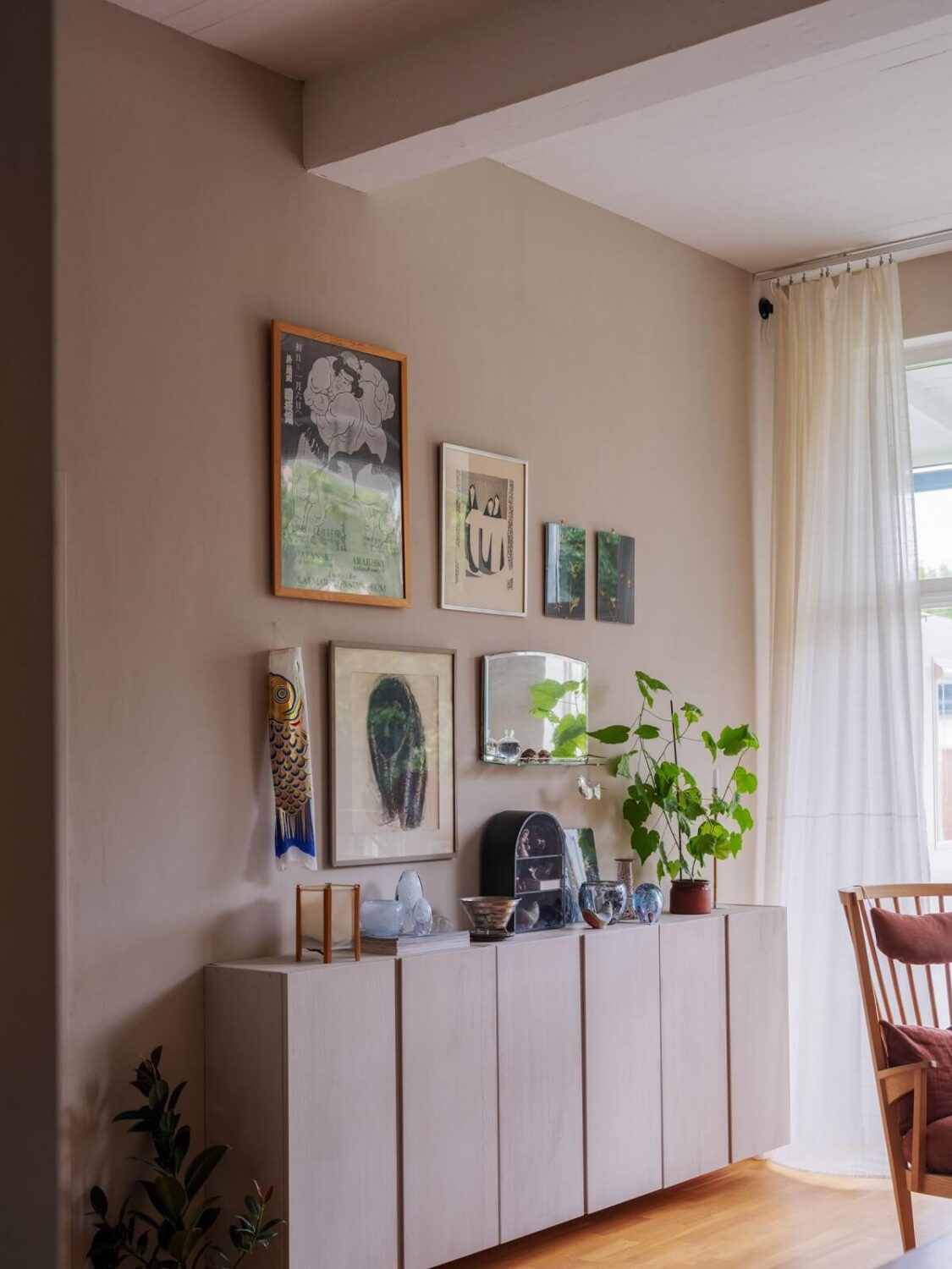 A Scandinavian Family Apartment with a Rusty Red Kitchen 4 ikea ivar cabinets gallery wall