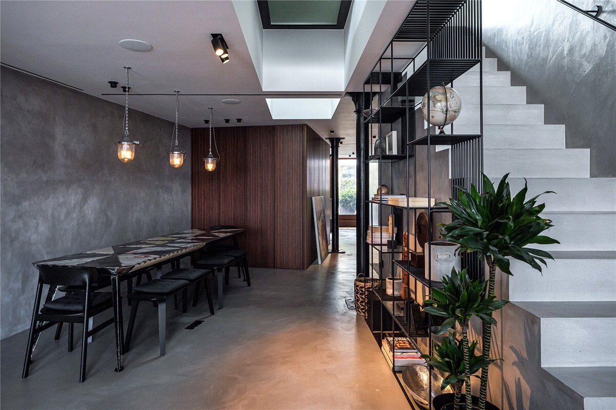 An Industrial, Loft-Style Duplex with Japanese Landscaped Roof Terraces 5 industrial gray dining room