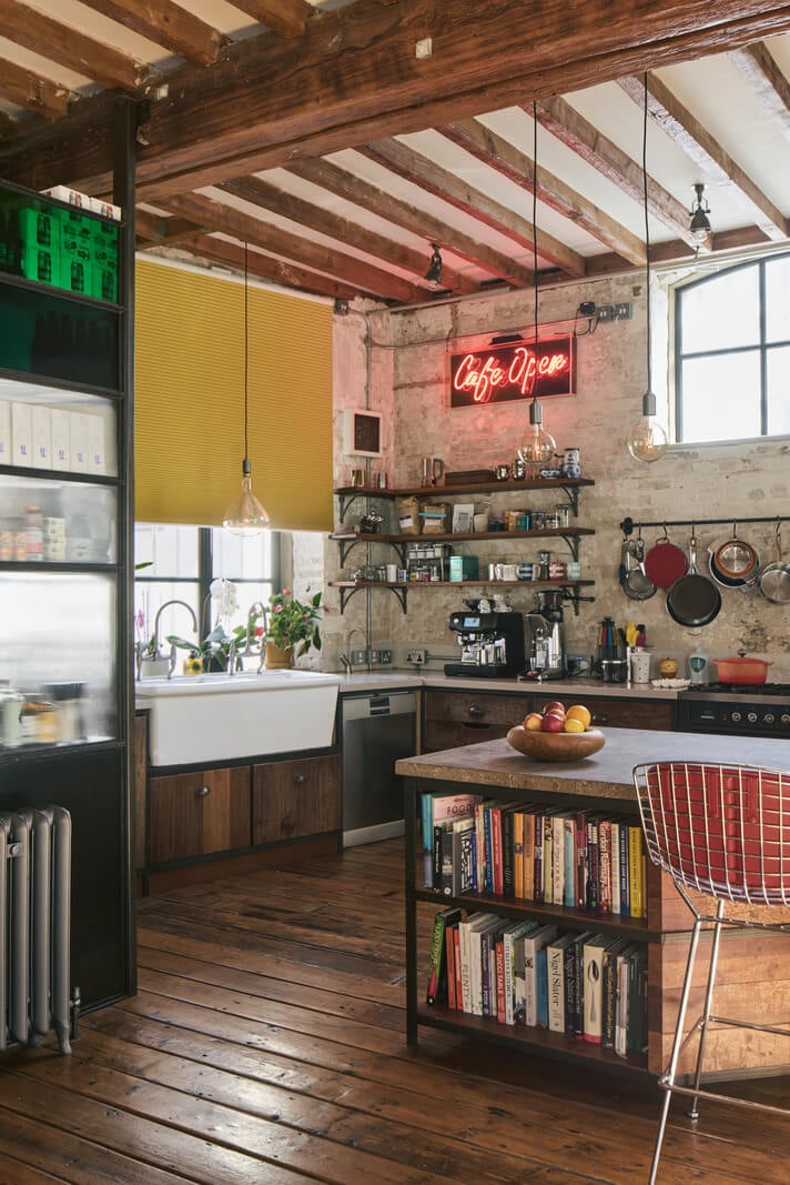 An Industrial and Colorful Warehouse Conversion in London 5 industrial kitchen with island and wooden beams