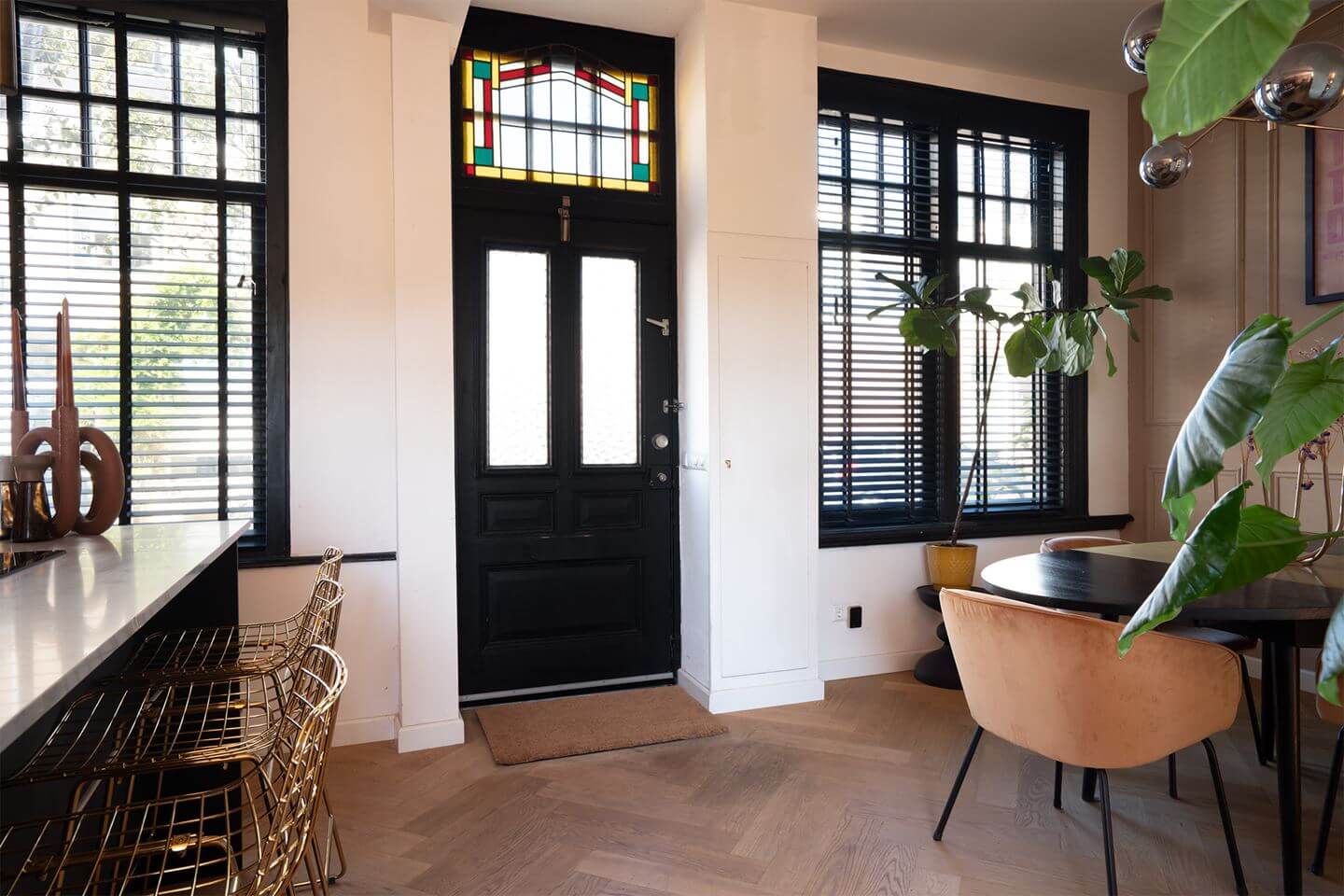 Rich Colors in a Charming Late 19th-Century Home in The Netherlands 11 kitchen and dining table stained glass windows nordroom