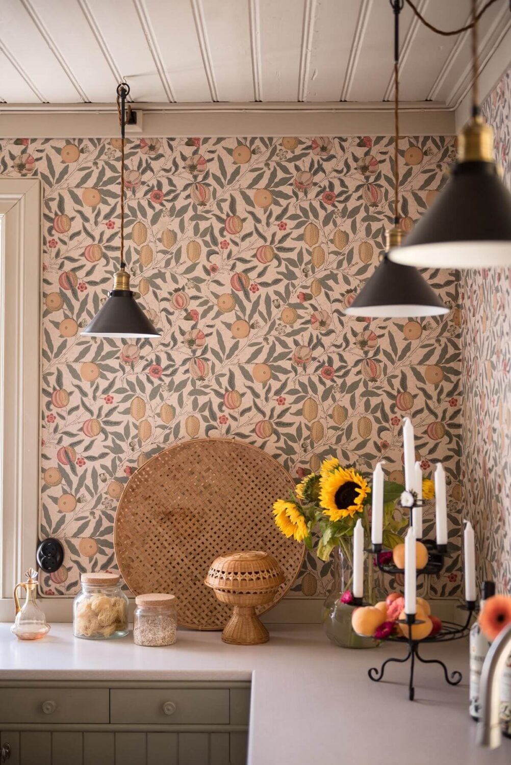 A Charming Country House with a Pink Dining Room and Wallpapers 3 kitchen detail pendants and lemon wallpaper