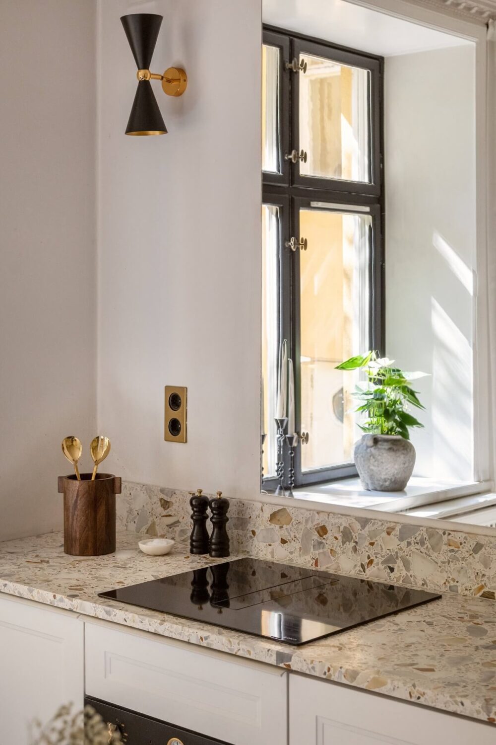 Why Everyone’s Adding Mirrors to Their Kitchens (And You Should Too) 22 kitchen detail with mirror