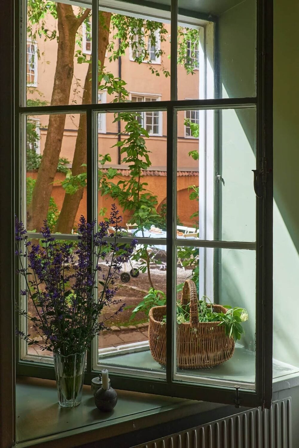 Soothing Colors and Smart Solutions in a Two Bedroom Apartment 3 kitchen window