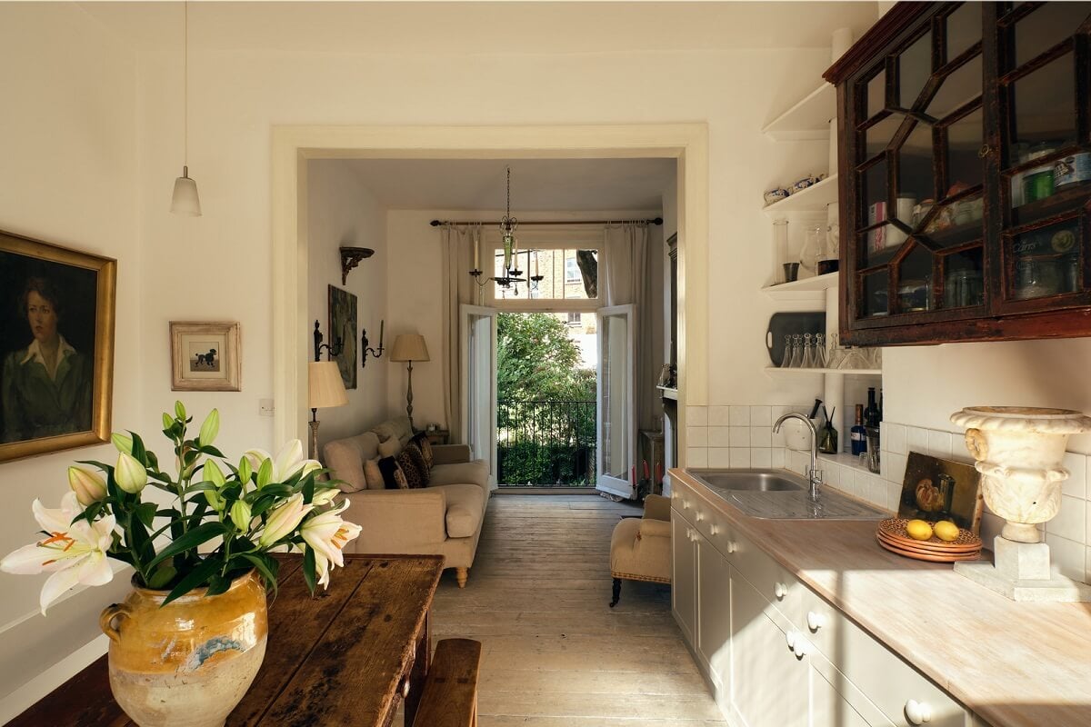 A One-Bedroom Maisonette with a Garden in London 6 kitchen with rustic wooden table