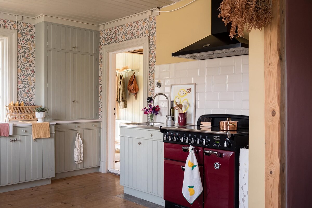 A Charming Country House with a Pink Dining Room and Wallpapers 5 kitchen yellow wall