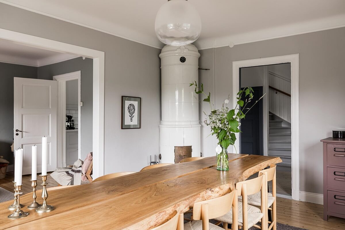 A Lovely Early 20th Century House with Wallpapers 5 large wooden table and fireplace dining room