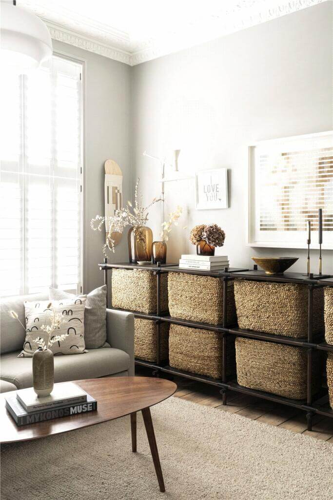 A Stylish Two Bedroom Maisonette in London 4 light gray living room jute rug natural storage baskets