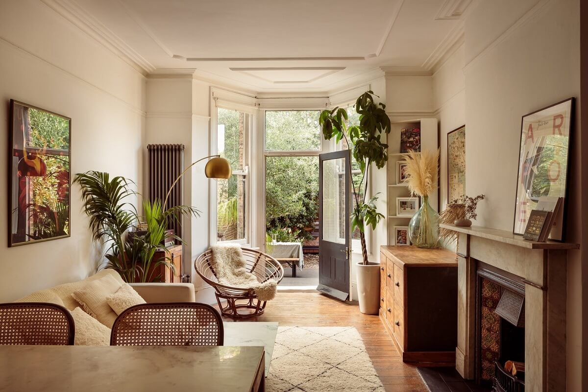 A Warm Ground Floor Apartment with Reclaimed Materials 1 light open plan living room with fireplace
