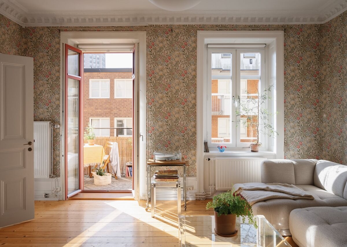 An Apartment with William Morris Wallpaper and a Dull Plum Bedroom 8 living room with wooden floor and natural light flowing in