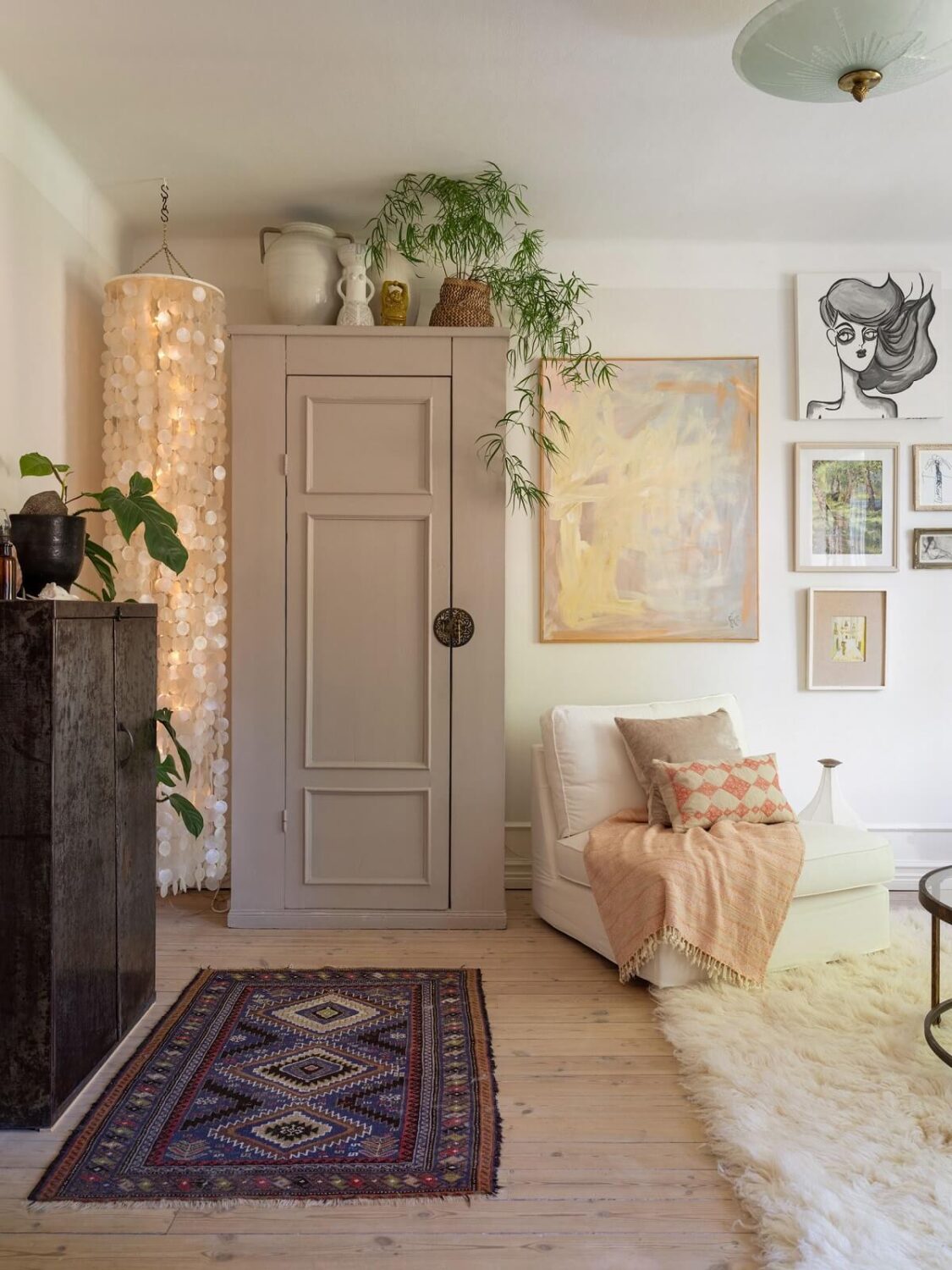 A Light and Well-Planned Apartment in Stockholm 6 living room wooden floor