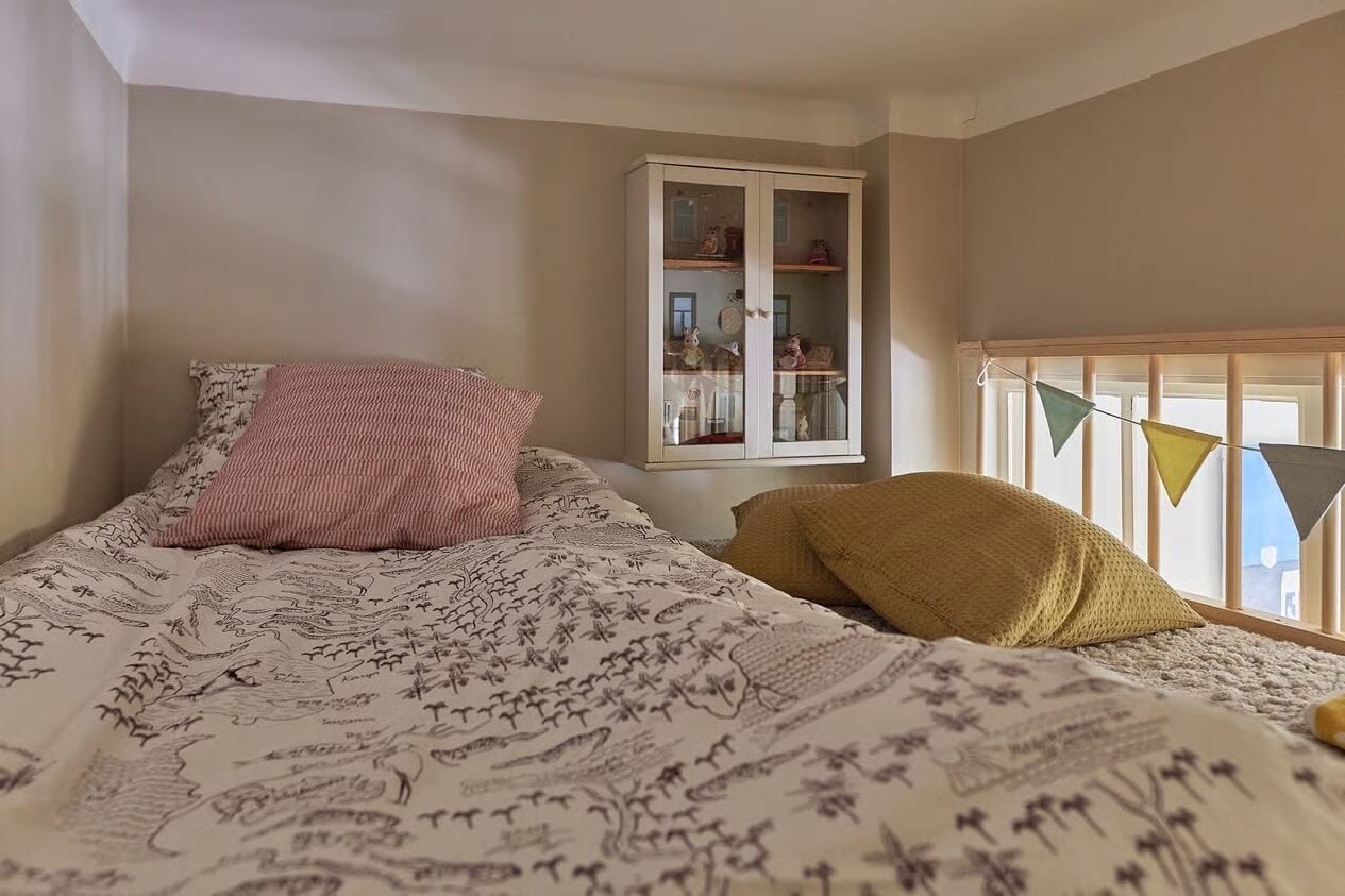 Soothing Colors and Smart Solutions in a Two Bedroom Apartment 18 loft bed with glass cabinet
