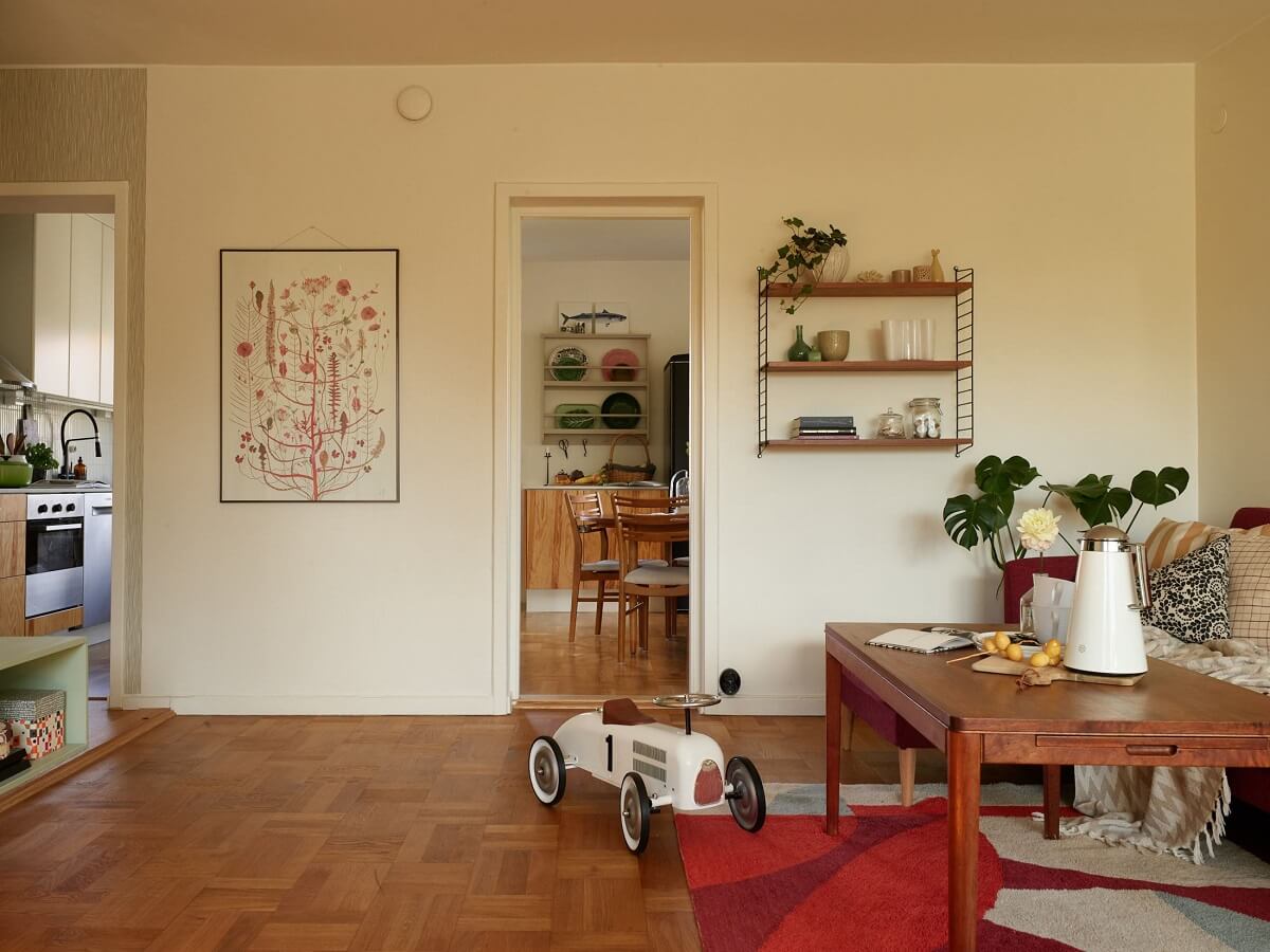A Midcentury Swedish Apartment with Bold Colors 5 midcentury apartment living room