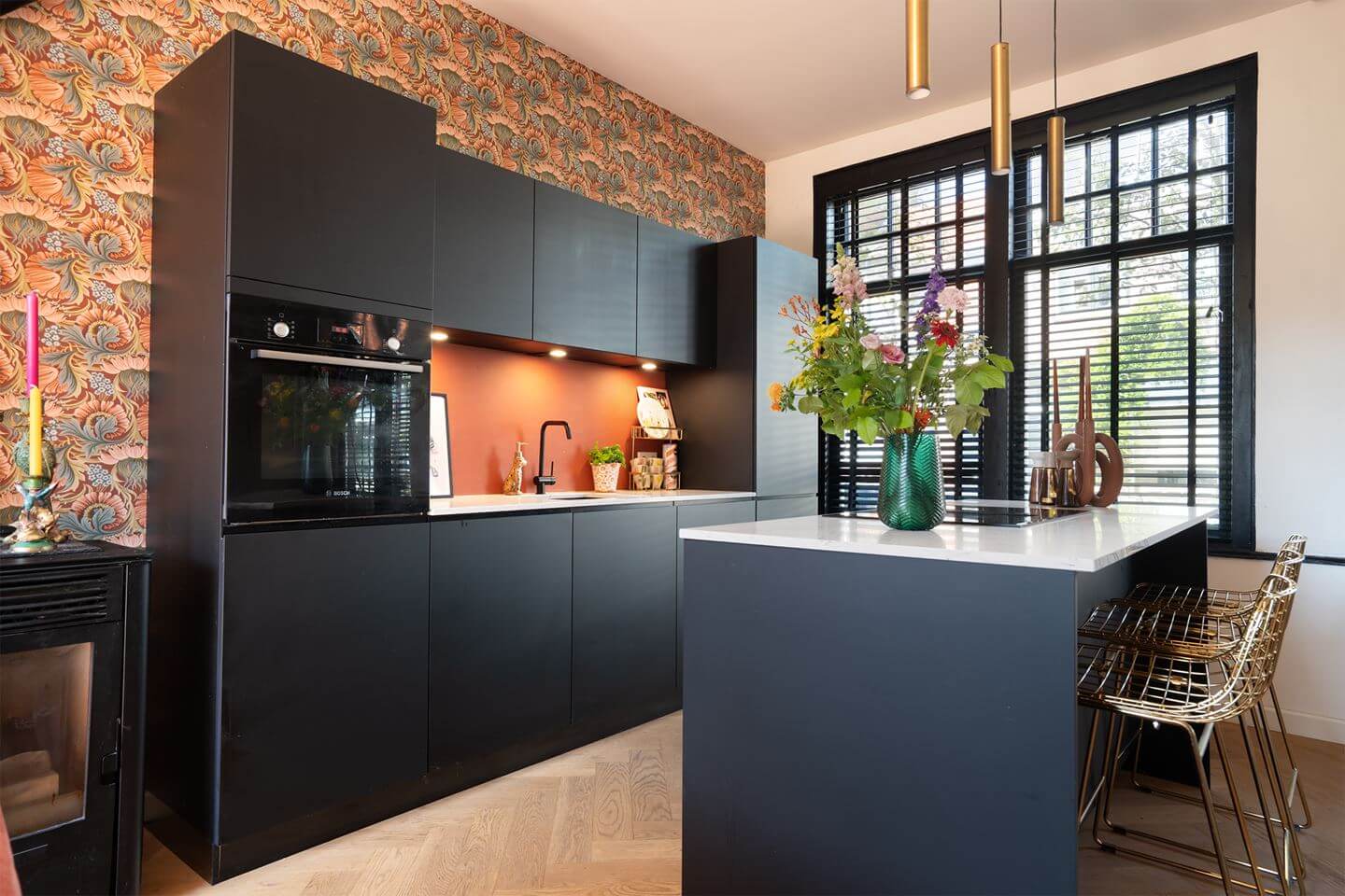 Rich Colors in a Charming Late 19th-Century Home in The Netherlands 8 modern black kitchen with island and wallpaper