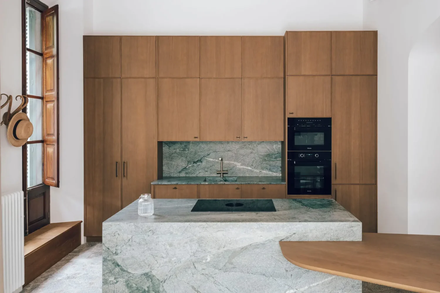 Beautiful Period Features in an Early 20th-Century Majorcan Townhouse 3 modern kitchen with marble island