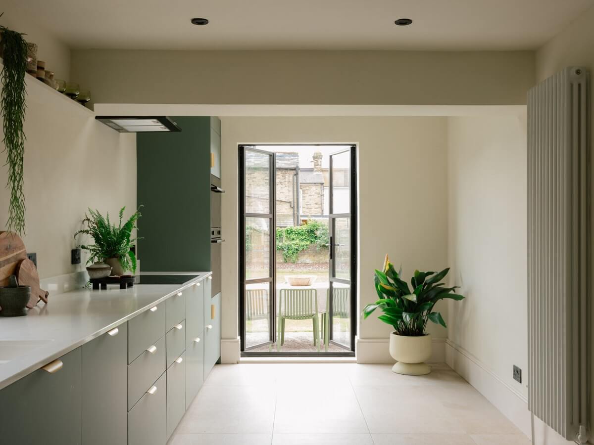 An English House with Carefully Restored Period Features 8 modern minimalistic kitchen with garden door