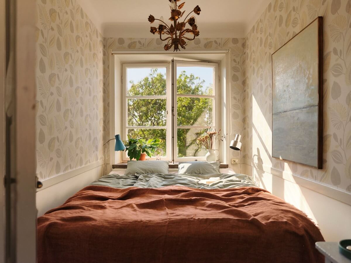 A Charming Small Two-Bedroom Apartment in Stockholm 16 narrow bedroom with wallpaper