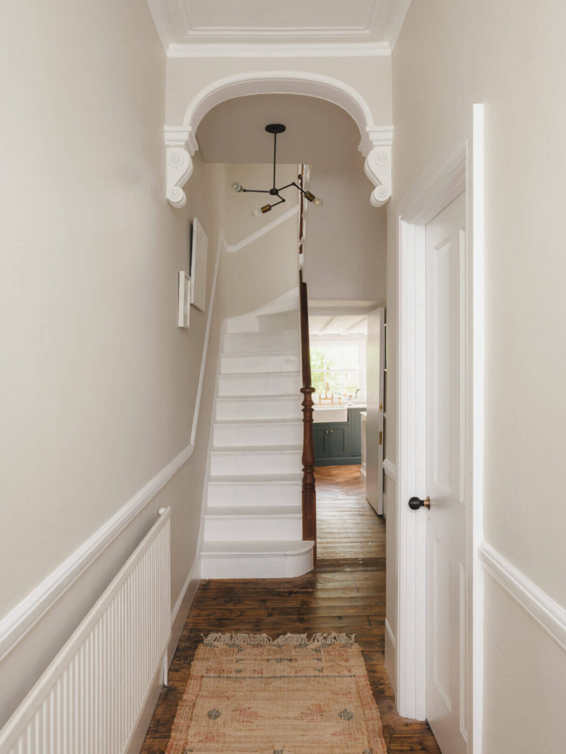 A Soft and Natural Color Palette in a Victorian Home 11 narrow hallway with period features