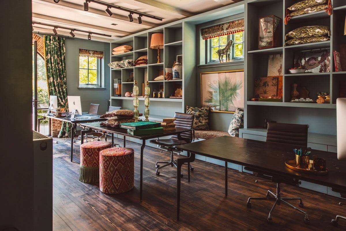 An Eclectic Colorful House in an Old Dutch Farmhouse 31 office space blue built in cabinets wooden floor