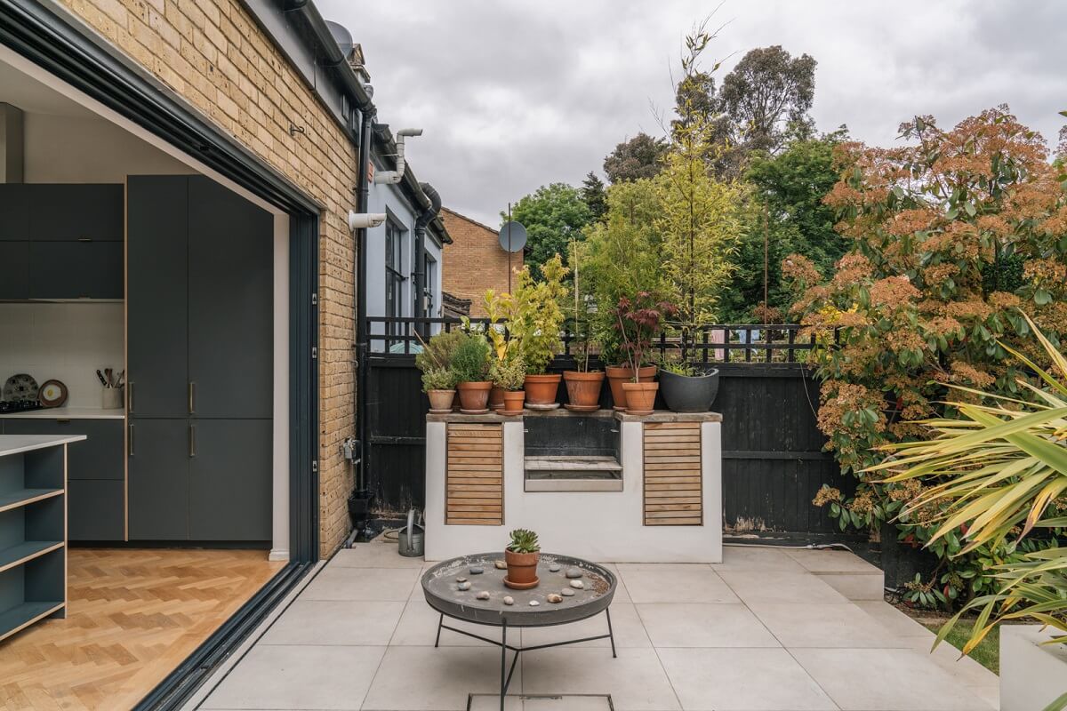 A Dark Blue Living Room in a Historic London Home 20 open connection kitchen garden