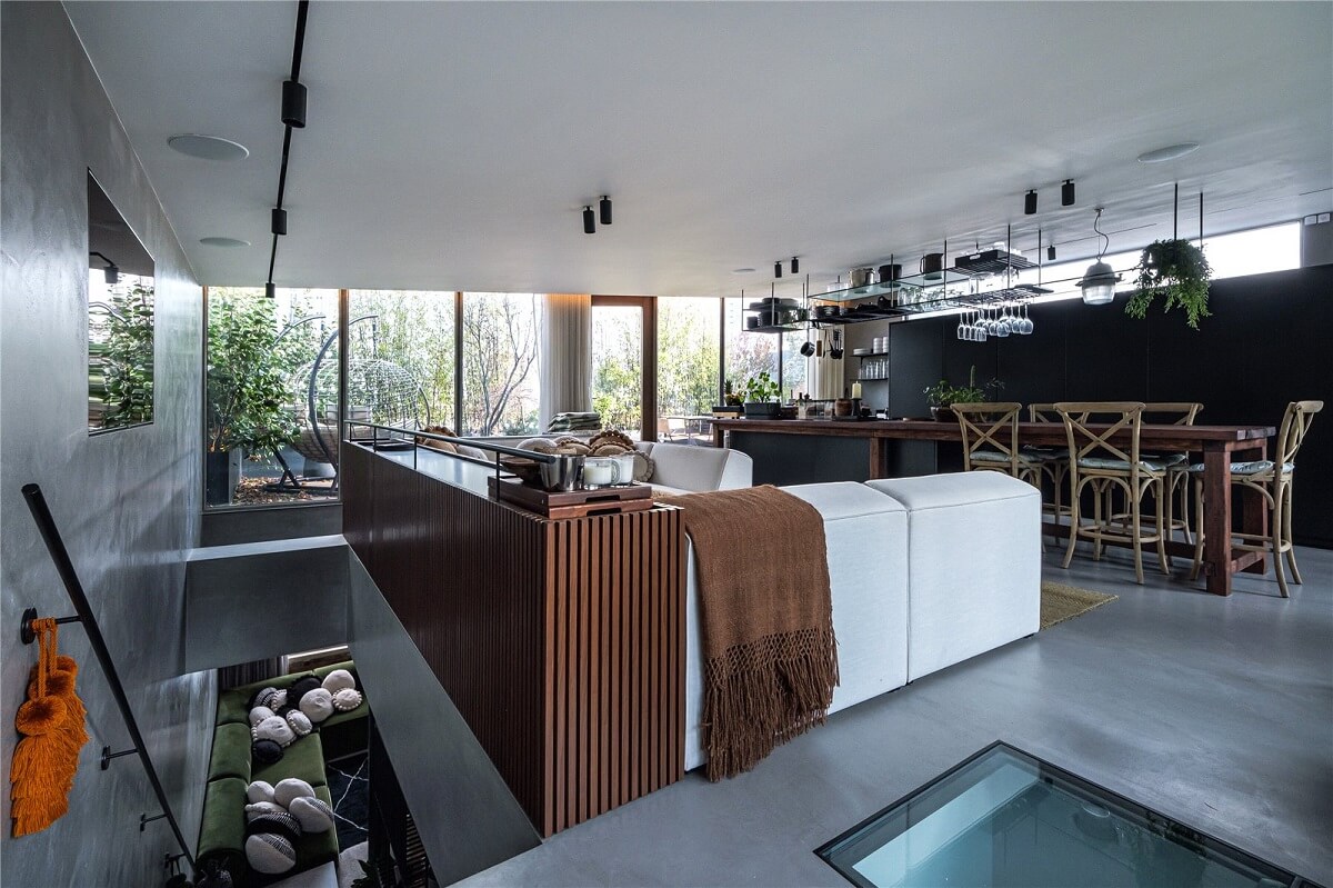 An Industrial, Loft-Style Duplex with Japanese Landscaped Roof Terraces 7 open plan living and kitchen industrial style